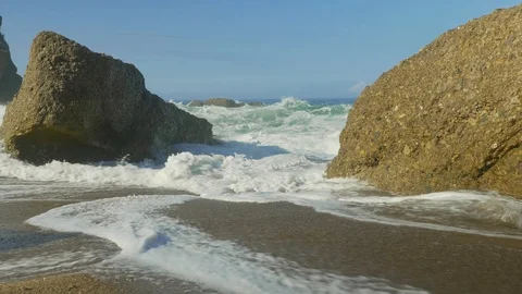 Blue Atlantic Ocean waves at the wild rocky beach Stock Footage 95548729