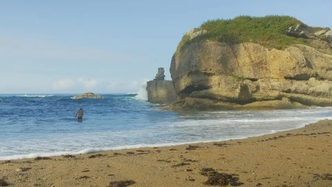 Blue Atlantic Ocean waves at the wild rocky beach Stock Footage 95550898