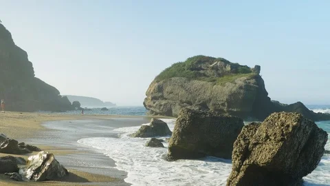 Blue Atlantic Ocean waves at the wild rocky beach Stock Footage 95554885