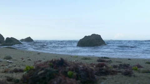 Blue Atlantic Ocean waves at the wild rocky beach Stock Footage 95558065
