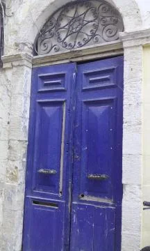 Blue authentic door with a pattern. Stock Photos