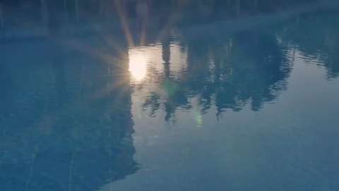 Blue background, bokeh. Beautiful reflections in the water. Stock Footage 82371477