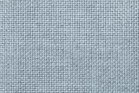 Blue background with braided checkered pattern, closeup. Stock Photos