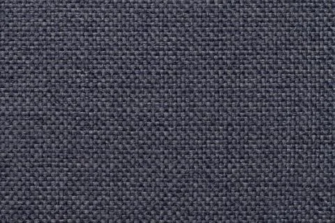 Blue background with braided checkered pattern. Texture of the weaving fabric Stock Photos