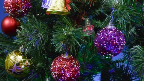 A blue background close-up of colored balls on a Christmas tree Stock Footage 166705902