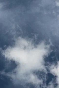 Blue background with clouds in cloudy weather Stock Photos