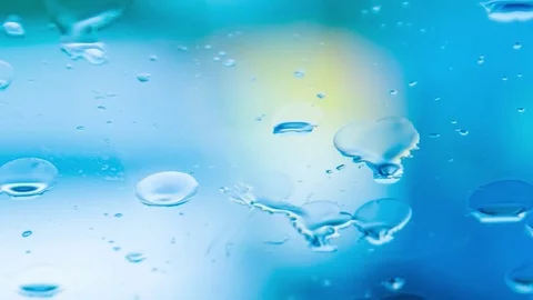 Blue background with drops and yellow spots Stock-Footage 74542374