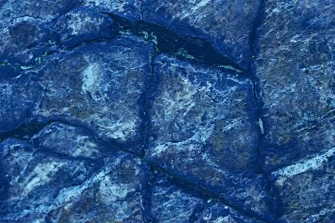 Blue background for graphic design.  Backdrop looks like stones or scales of rep Stock Photos