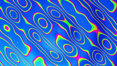 Blue background with a multicolored pattern. Infinitely looped animation Stock Footage 223201713