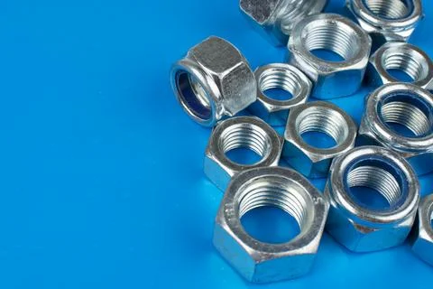 On a blue background nuts close up Foto stock