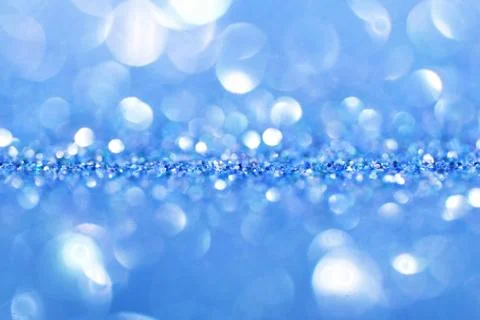 Blue background with sparkles Stock Photos