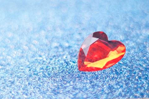 Blue background with sparkles with shallow depth of field. Soft focus. Red he Stock Photos