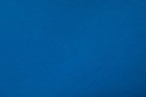 Blue background with texture, horizontal, place for text. Stock Photos