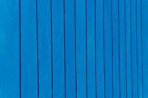 Blue background with vertical lines. metal fence Stockfoto's