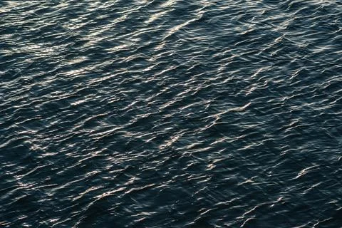 Blue background of the water surface Stock Photos