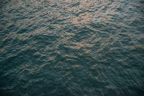 Blue background of the water surface Stock Photos