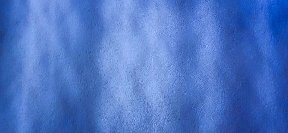 Blue background with a wavy texture Stock Photos