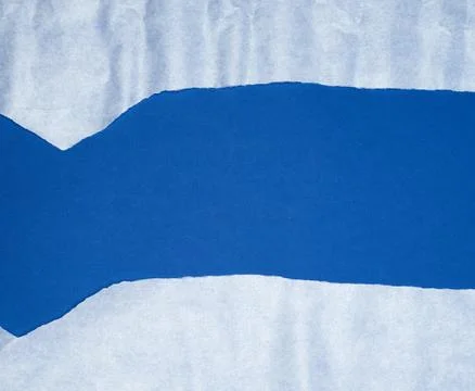 Blue background with white crumpled torn paper elements Stock Photos
