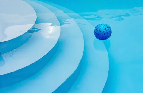 Blue ball in a blue pool Stock Photos