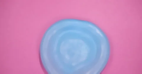 Blue Ball on Pink Background Stock Footage 212649185