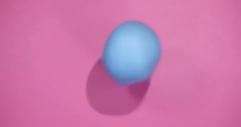Blue Ball on Pink Background Stock Footage 212650148