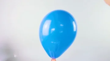 Blue Balloon Being Popped On White Backg... | Stock Video | Pond5