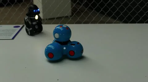 Blue balls-shaped robot moving towards the black one 스톡 동영상 67251215