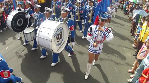 Blue Band Marching with flag waver overhead shot Stock Footage 34193963