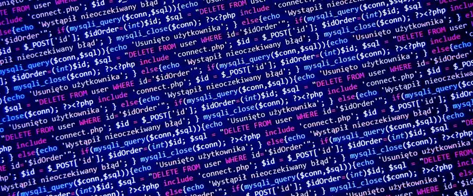 Blue banner with php language code on development monitor. Coding concept Foto stock