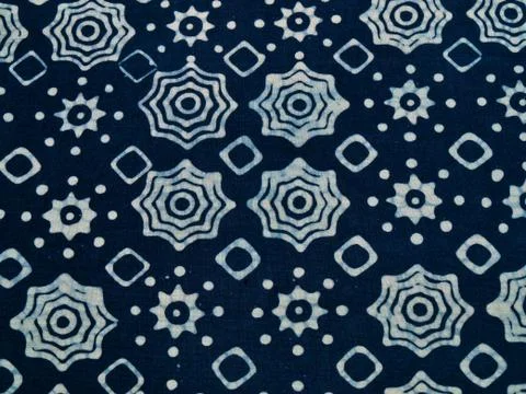 Blue batik fabric with repettition pattern as background from yogyakarta, ind Stock Photos