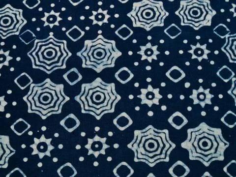 Blue batik fabric with repettition pattern as background from yogyakarta, ind Stock Photos