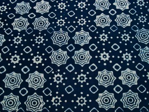Blue batik fabric with repettition pattern as background from yogyakarta, ind Stock Photos
