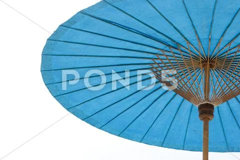 Blue beach umbrella with sky Stock Photos