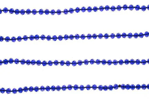 Blue beads on a white background Stock Photos