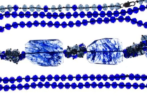 Blue beads on a white background Stock Photos