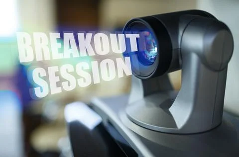 A blue beam glows from the projector inside which is the inscription - Brea.. Stock Photos