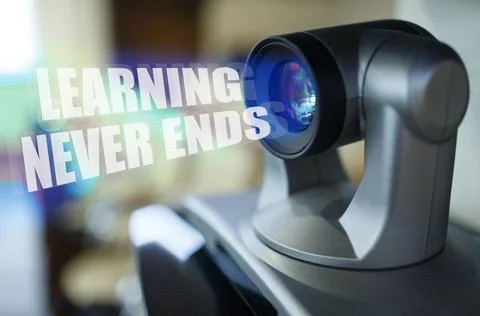 A blue beam glows from the projector inside which is the inscription - Lear.. Stock Photos