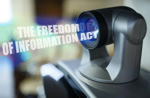 A blue beam glows from the projector inside which is the inscription - THE .. Stock Photos