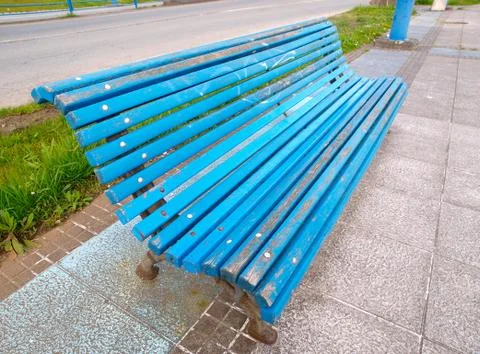 Blue bench in diagonal composition. Stock Photos