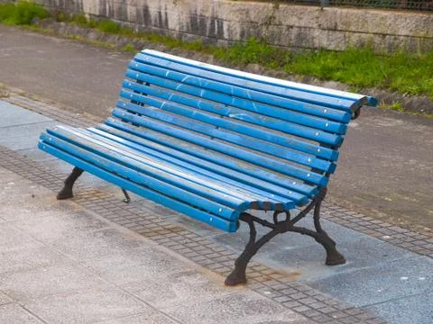 Blue bench in diagonal composition. Stock Photos