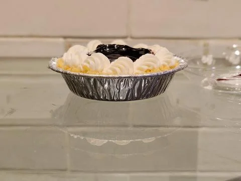 Blue berry pie tray on table. Stock Photos