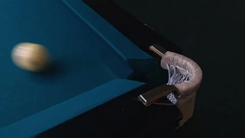Blue billiard table. The ball flies into the hole. Slow motion Stock Footage 221568518