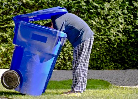 Blue bin man. Stock Photos