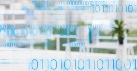 Blue binary code against blurry white office 스톡 사진