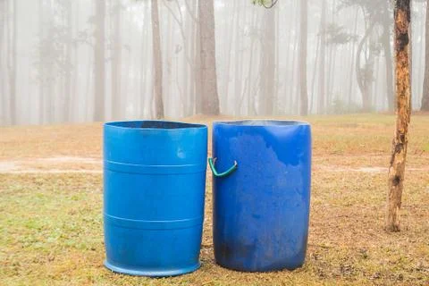 Blue bins in parks Foto stock