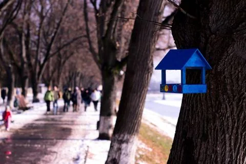 Blue birdhouse on tree Stock Photos