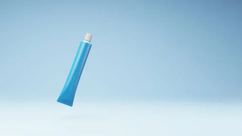 Blue Blank Tube of Toothpaste Spinning on Studio Blue Background Stock Footage 234413510