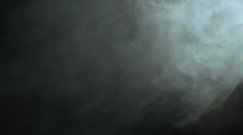 Blue bluish smoke in the studio against black background Stock Footage 46499963