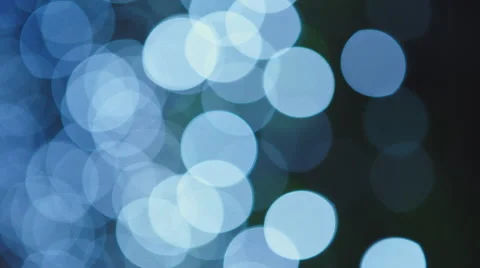 Blue, blurred, bokeh lights background. Abstract sparkles. Stock-Footage 66680858