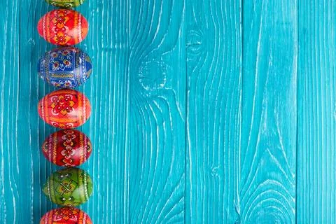 Blue boards with painted eggs easter day Stock Photos